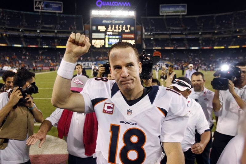 What was Peyton Manning's career completion percentage?