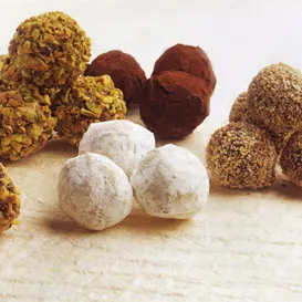 What is the ideal temperature for melting chocolate when making truffles?