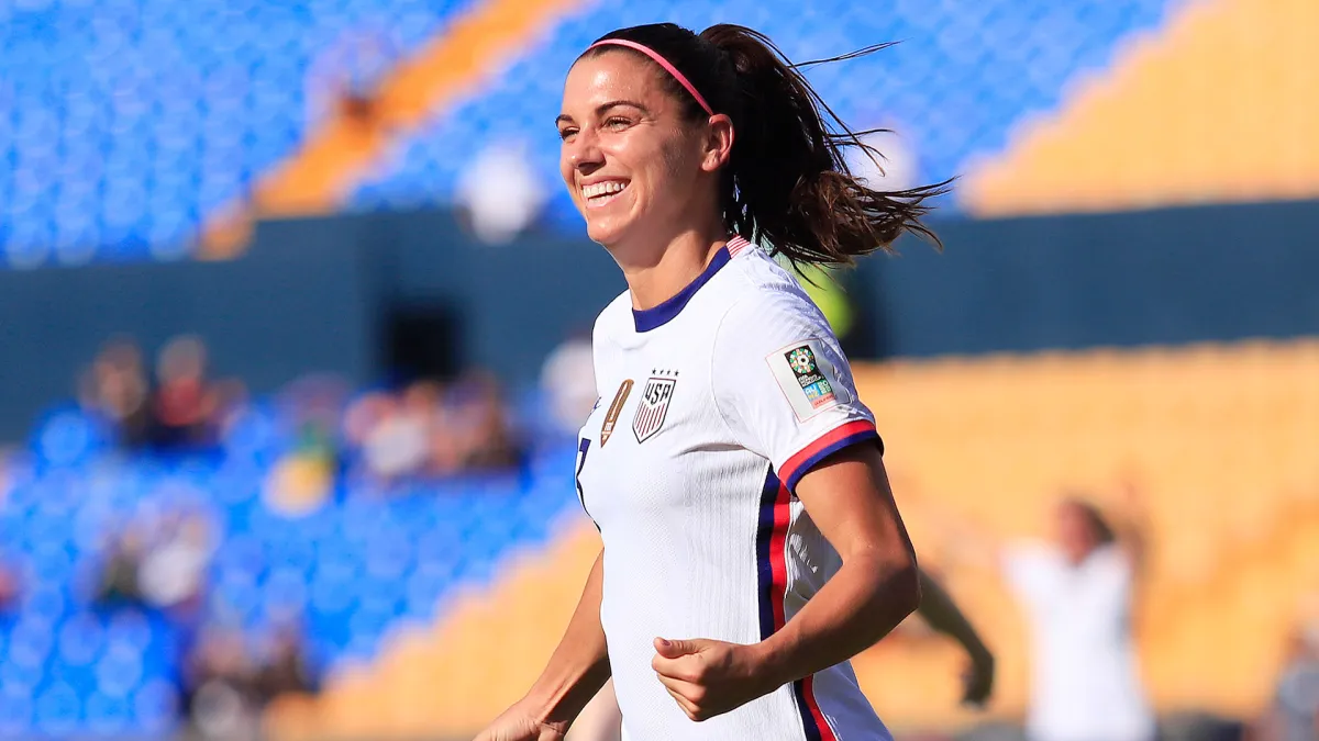 How many goals did Alex Morgan score in her professional debut for the Western New York Flash in 2011?