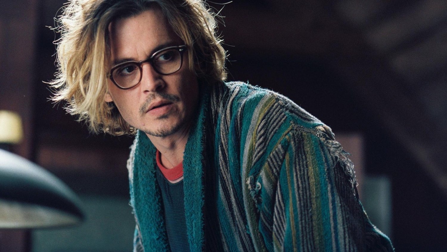 Which film marked Johnny Depp's first collaboration with director Tim Burton?