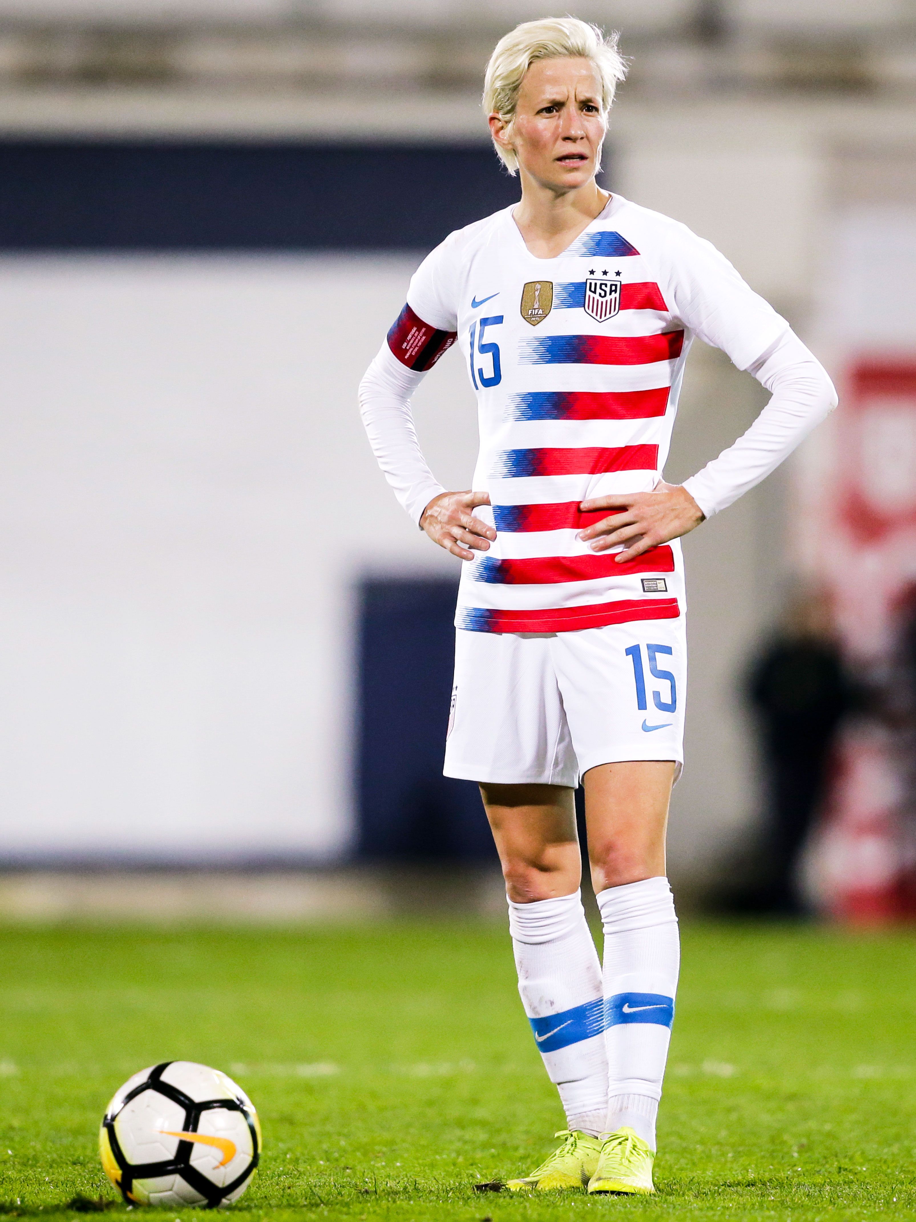 Who is Megan Rapinoe's twin sister and fellow professional soccer player?
