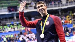 Which swimming event is not one of Michael Phelps' specialties?