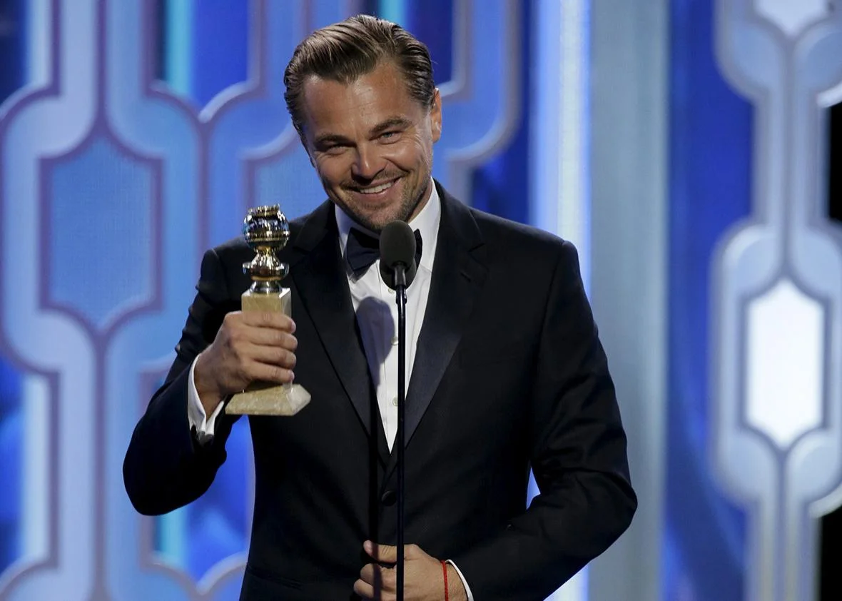 Which movie earned Leonardo DiCaprio his first Academy Award for Best Actor?