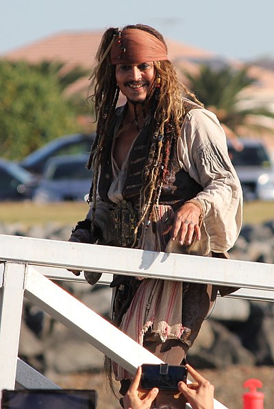 Which director has collaborated with Johnny Depp on multiple films?