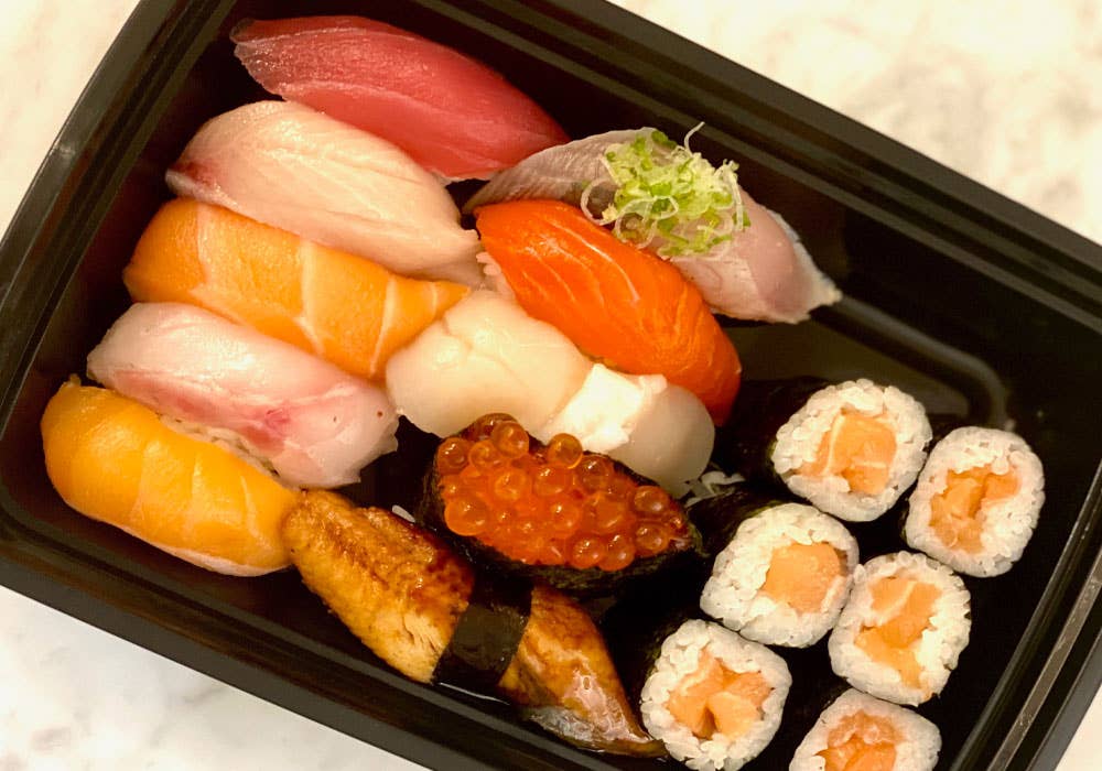 What is the main difference between sushi and sashimi?
