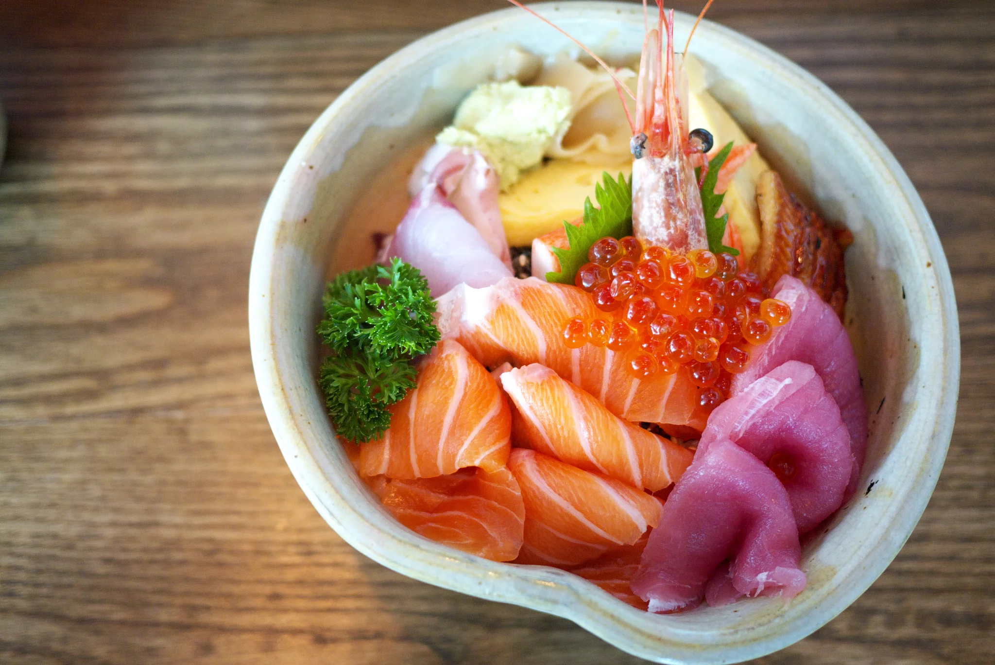 What is the purpose of pickled ginger in sushi and sashimi?