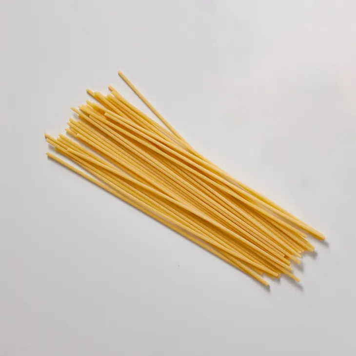 What pasta shape is tube-like with ridges on the outside?