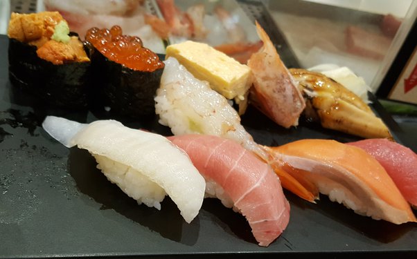 What is the meaning of the word 'sushi'?