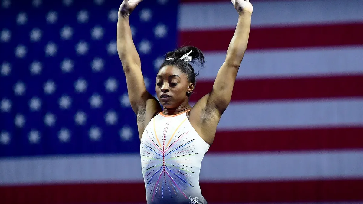 Which move did Simone Biles successfully perform during the 2019 World Championships, becoming the first woman to ever land it in competition?