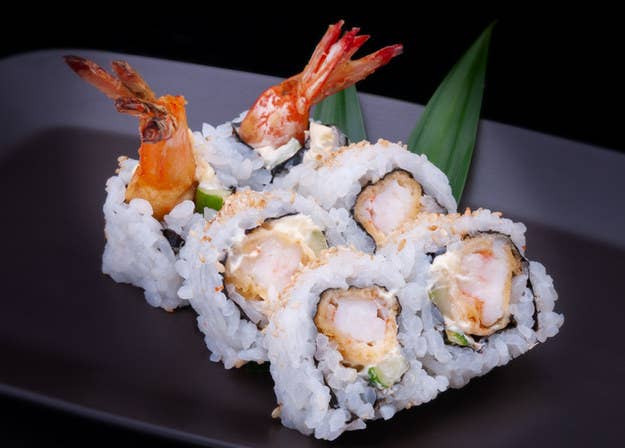 Which ingredient adds a crunchy texture to a sushi roll?