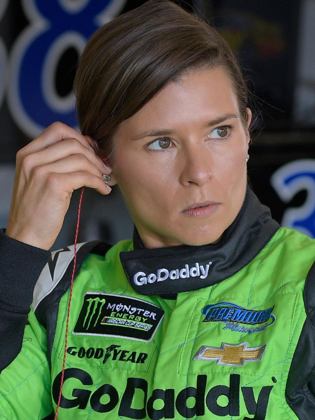 Which sponsor was prominently featured on Danica Patrick's race cars throughout her career?