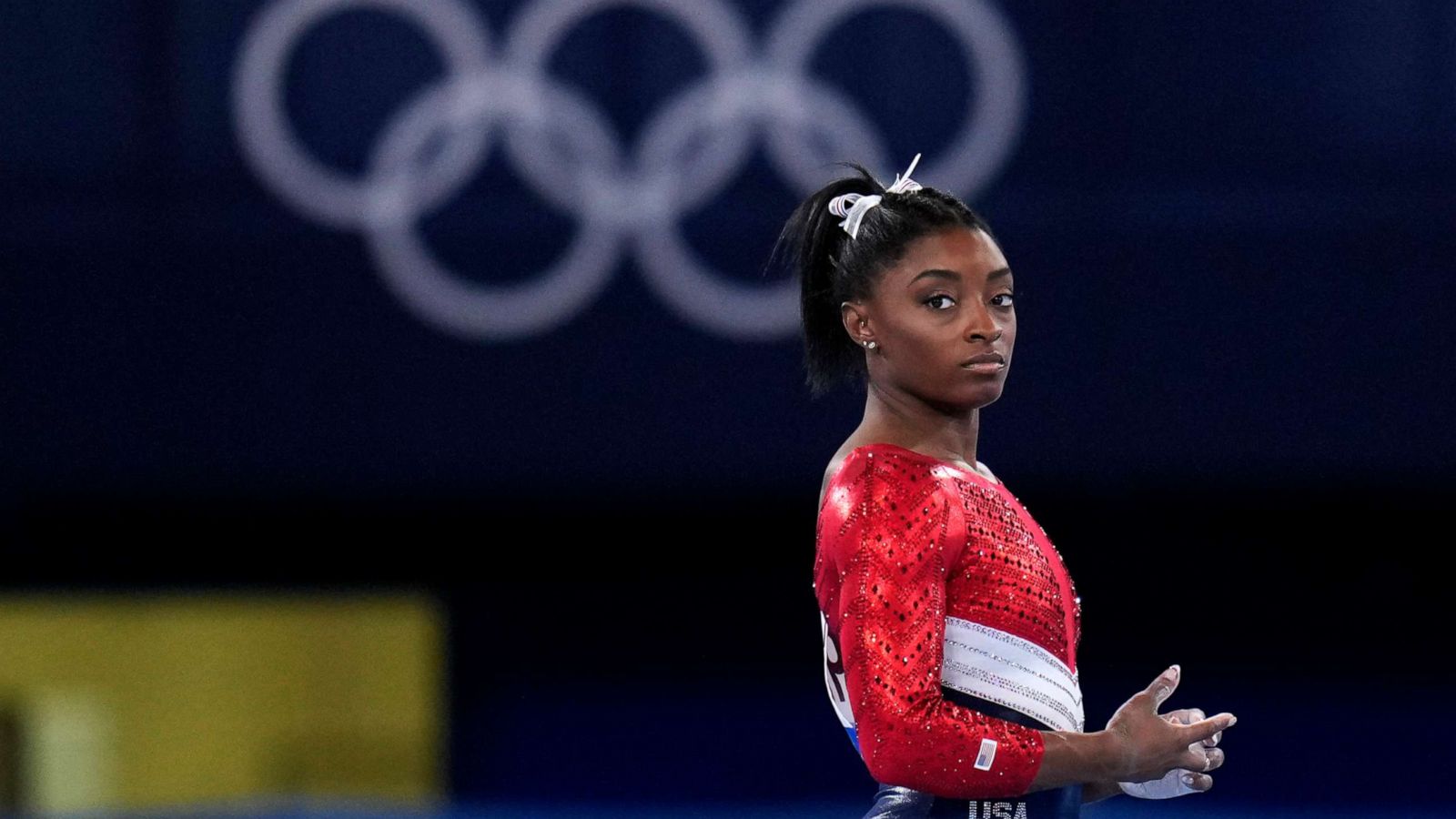 Which gymnastics skill is Simone Biles known for on the balance beam?