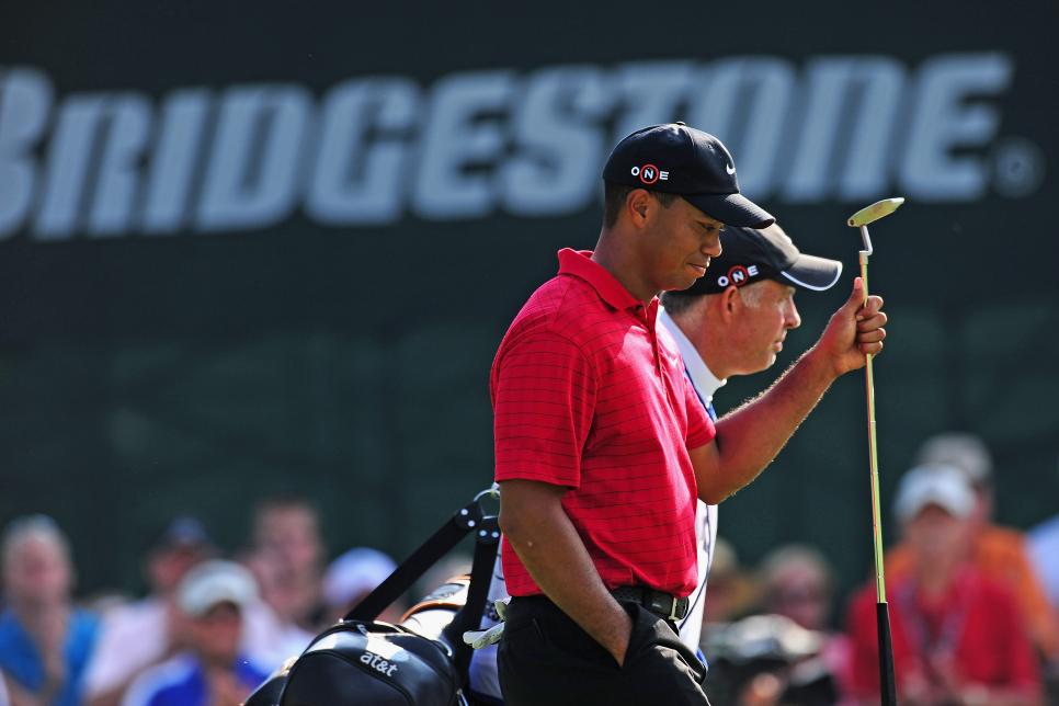 Which major championship did Tiger Woods win by a record 18-under-par score?