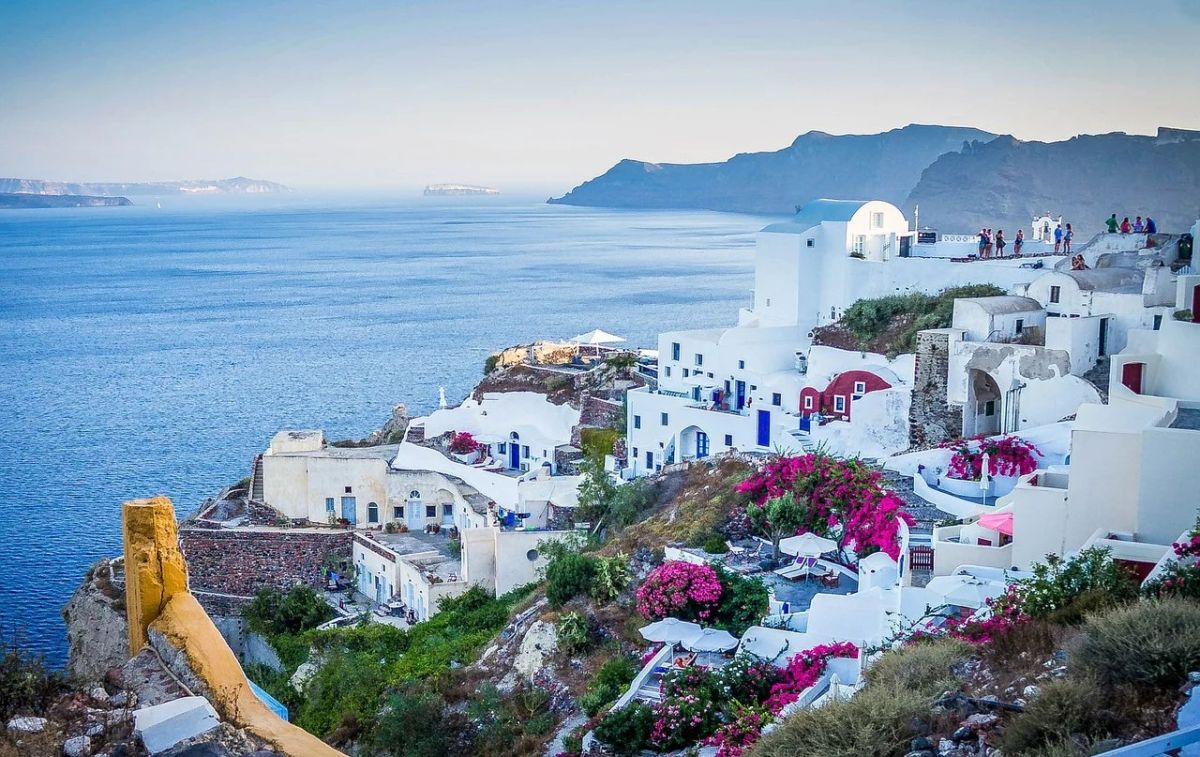 Which famous Greek mythological figure had a connection to Santorini?