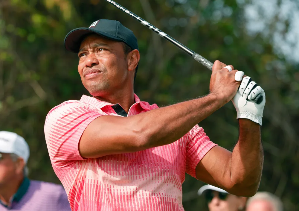 Which major championship did Tiger Woods win by a playoff victory?