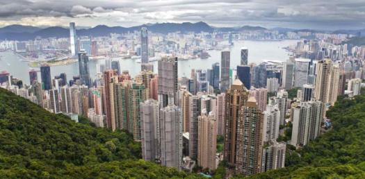 Which Hong Kong neighborhood is known for its vibrant nightlife and entertainment venues?