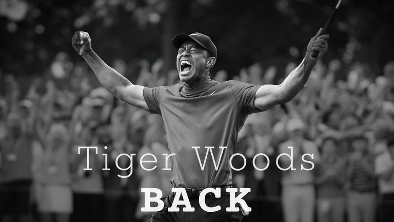 In which year did Tiger Woods complete the 'Tiger Slam' by winning all four major championships in a row?