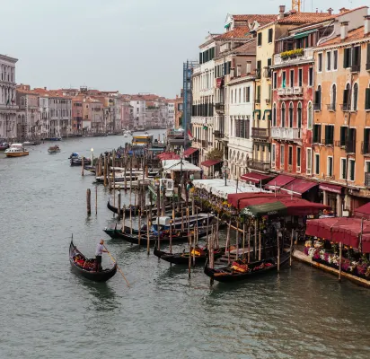 What is the name of the traditional Venetian rowing race held annually on the Grand Canal?